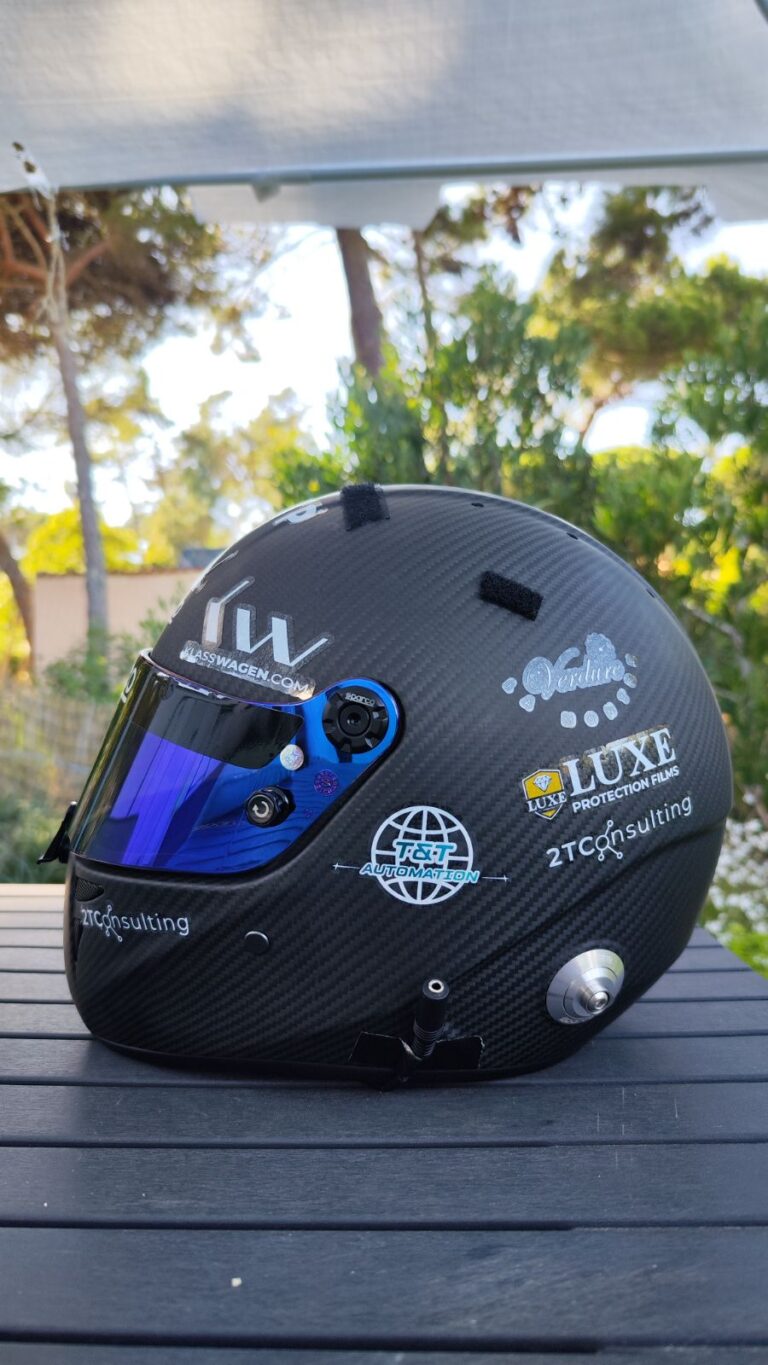Miguel Gaspar's carbon race helmet with LUXE Protection Films branding for the Valencia GT4 race weekend